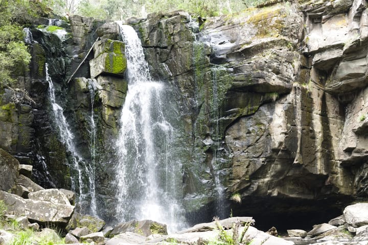 A waterfall over a rocky ledge.